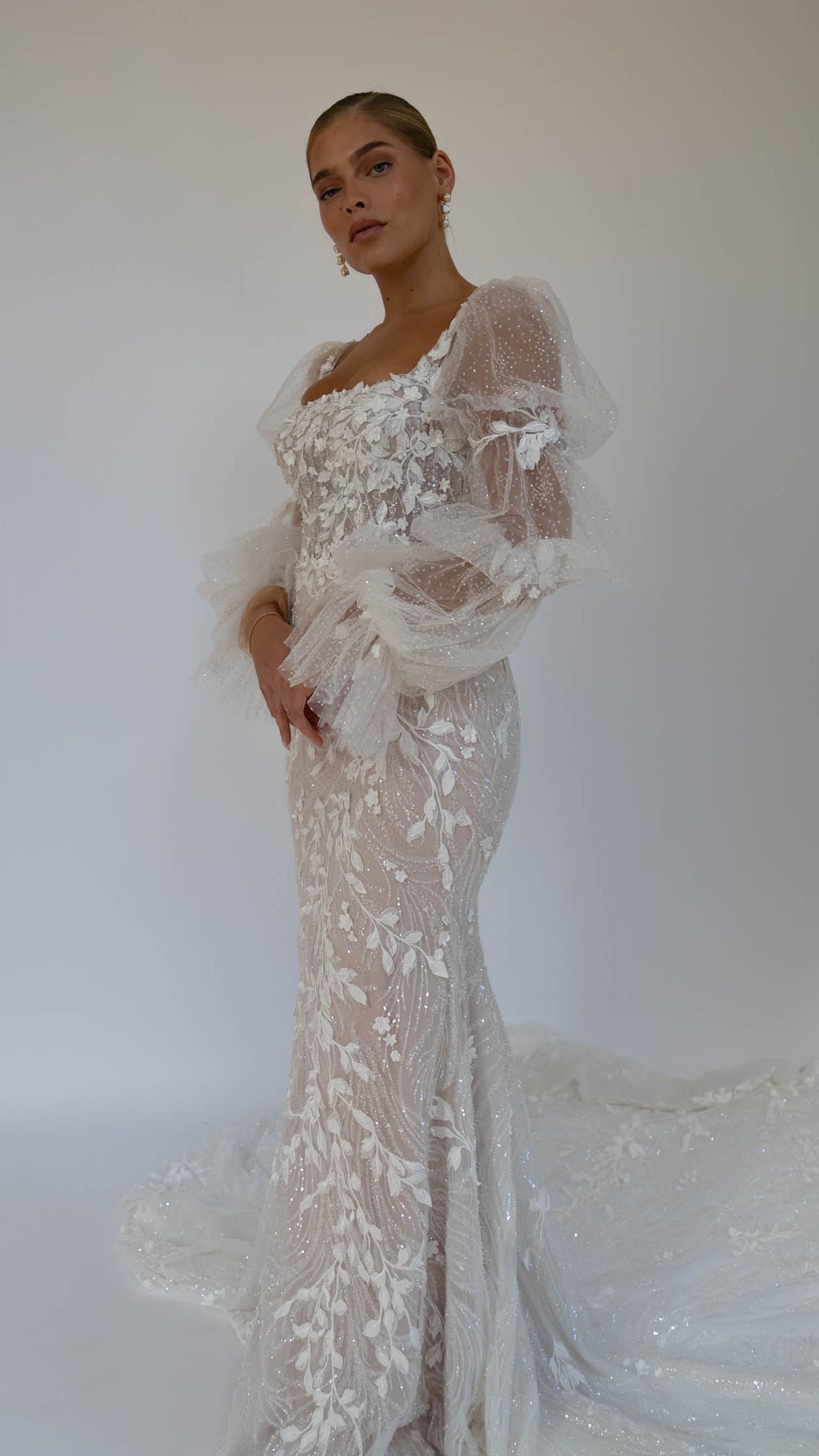 We’re addicted & we just can’t get enough … ◊Make a captivating entrance on your wedding day with MONTREAL by @jeune_bridal , this fit & flare wedding dress exudes sensuality ◊Delicate layers of 3D embroidery, sequins, bead motifs & glitter tulle create a mesmerizing effect, softly flowing into a fit & flare skirt with a horsehair hem & an illusion train ◊Her illusion square neckline bodice with centre back buttons add sophistication, while the detachable balloon sleeves attached to the shoulder straps add a romantic touch ◊#youarepreciousbridal #bridalstudio #newcastlebride #bride #bridalgown #bridalinspo #weddingdress #bride2025 #2024bride #bride2024 #bridalstyle #stylishbride  #bohobride #modernbride #yestothedress #youarepreciousloves #dressoftheday #isaidyes #weddingdressgoals #dressgoals #dreamweddingdress #designerbridal #elegantwedding #jeunebridal #montrealjeunebridal #newtonhall #lepetitchateau #wylambrewery #beamishhall #lartingtonhall